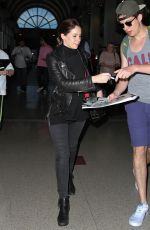 FELICITY JONES Arrives at Los Angeles International Airport 0701