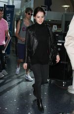 FELICITY JONES Arrives at Los Angeles International Airport 0701