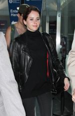 FELICITY JONES Arrives at Los Angeles International Airport 0701