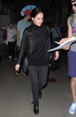 FELICITY JONES Arrives at Los Angeles International Airport 0701