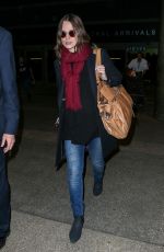 KEIRA KNIGHTLEY at Heathrow Airport