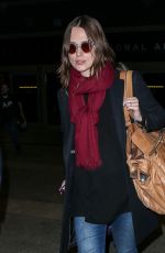 KEIRA KNIGHTLEY at Heathrow Airport