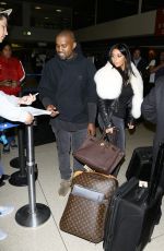 KIM KARDASHIAN and Kanye West at Los Angeles International Airport 0701