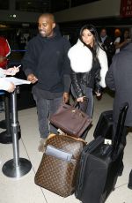 KIM KARDASHIAN and Kanye West at Los Angeles International Airport 0701