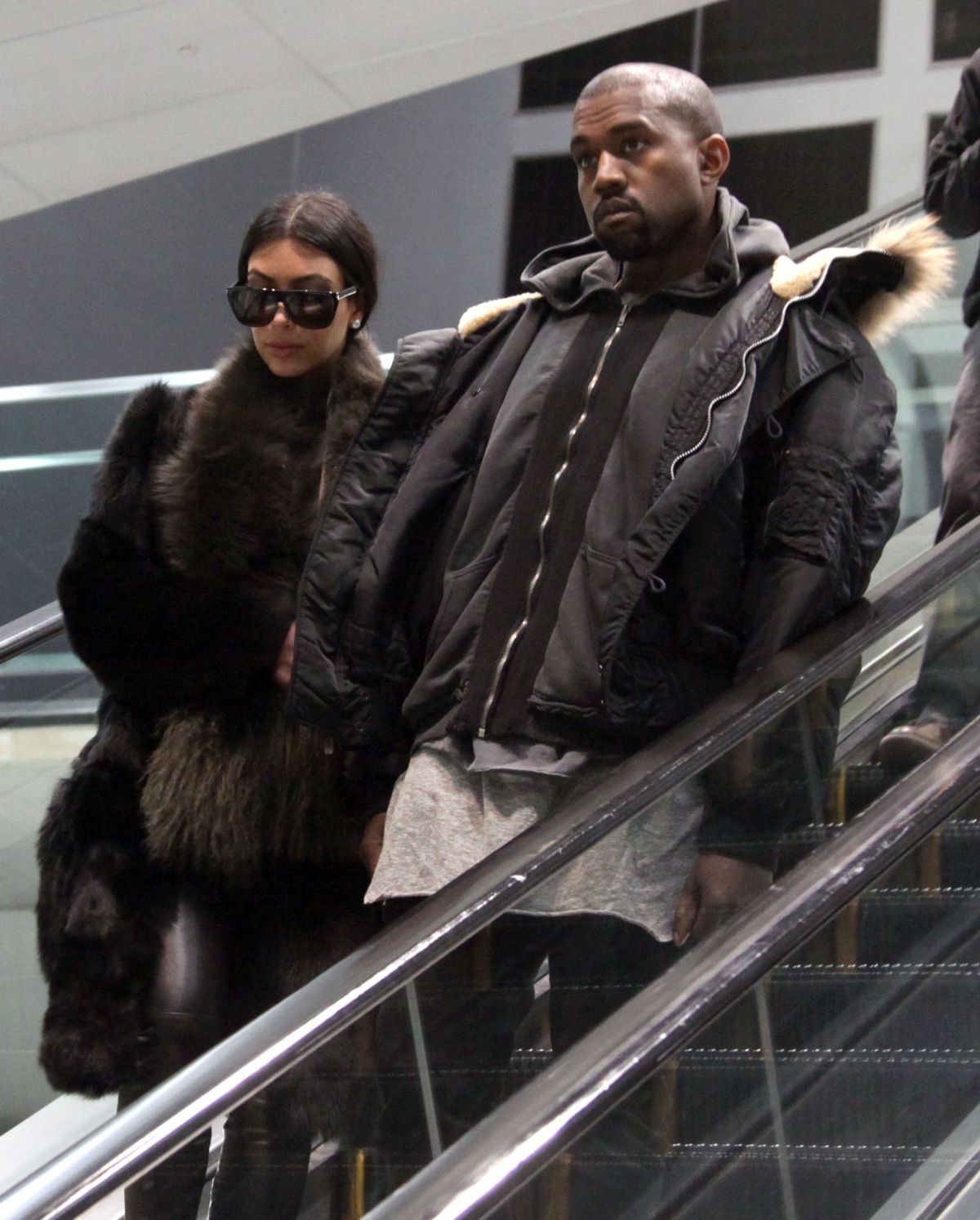 KIM KARDASHIAN and Kanye West at Washington Dulles International Airport KIM KARDASHIAN and Kanye West at Washington Dulles International Airport