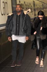 KIM KARDASHIAN and Kanye West at Washington Dulles International Airport