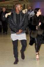KIM KARDASHIAN and Kanye West at Washington Dulles International Airport