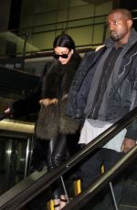 KIM KARDASHIAN and Kanye West at Washington Dulles International Airport