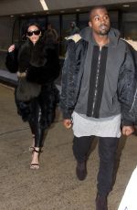 KIM KARDASHIAN and Kanye West at Washington Dulles International Airport