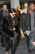 KIM KARDASHIAN and Kanye West at Washington Dulles International Airport