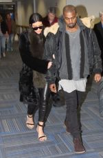 KIM KARDASHIAN and Kanye West at Washington Dulles International Airport