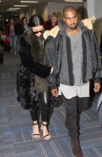 KIM KARDASHIAN and Kanye West at Washington Dulles International Airport
