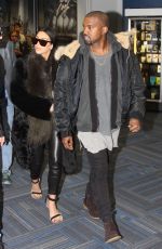 KIM KARDASHIAN and Kanye West at Washington Dulles International Airport