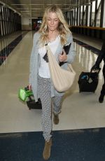 LEANN RIMES Arrives at Los Angeles International Airport