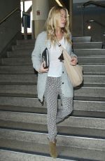 LEANN RIMES Arrives at Los Angeles International Airport