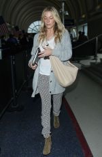 LEANN RIMES Arrives at Los Angeles International Airport