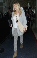LEANN RIMES Arrives at Los Angeles International Airport