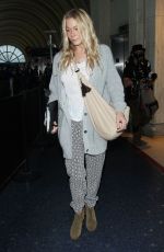 LEANN RIMES Arrives at Los Angeles International Airport