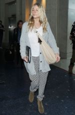 LEANN RIMES Arrives at Los Angeles International Airport