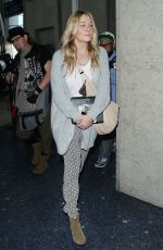 LEANN RIMES Arrives at Los Angeles International Airport