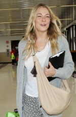 LEANN RIMES Arrives at Los Angeles International Airport