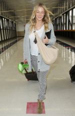 LEANN RIMES Arrives at Los Angeles International Airport