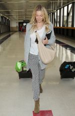 LEANN RIMES Arrives at Los Angeles International Airport