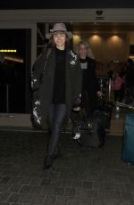 LILY COLLINS at Los Angeles International Airport 0901