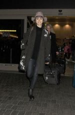 LILY COLLINS at Los Angeles International Airport 0901