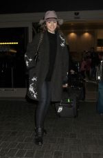 LILY COLLINS at Los Angeles International Airport 0901