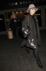 LILY COLLINS at Los Angeles International Airport 0901