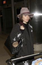 LILY COLLINS at Los Angeles International Airport 0901