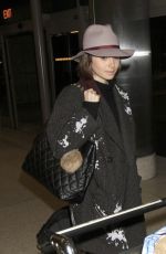 LILY COLLINS at Los Angeles International Airport 0901