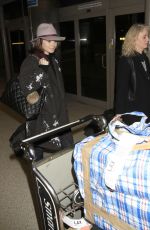 LILY COLLINS at Los Angeles International Airport 0901