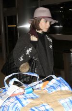 LILY COLLINS at Los Angeles International Airport 0901