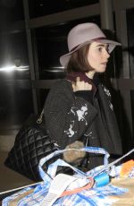 LILY COLLINS at Los Angeles International Airport 0901
