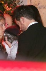 LILY COLLINS Leaves a Golden Globes After Party