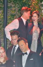 LILY COLLINS Leaves a Golden Globes After Party