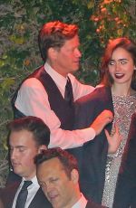 LILY COLLINS Leaves a Golden Globes After Party