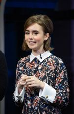 LILY COLLINS on the Set of Extra at Universal Studios in Hollywood
