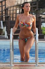 LUCY MECKLENBURGH in Bikini at a Pool in Dubai