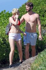 MILEY CYRUS and Patrick Schwarzenegger on Vacation in Hawaii
