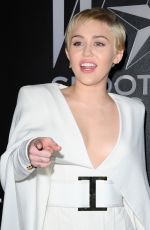 MILEY CYRUS at W Magazine Shooting Stars Exhibit Opening in Los Angeles