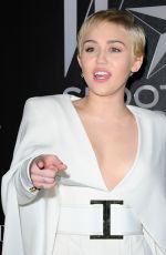 MILEY CYRUS at W Magazine Shooting Stars Exhibit Opening in Los Angeles