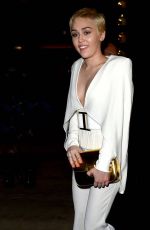 MILEY CYRUS at W Magazine Shooting Stars Exhibit Opening in Los Angeles