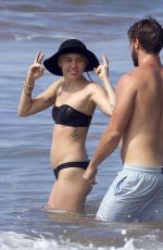 MILEY CYRUS in Bikini and Patrick Schwarzenegger on the Beach in Hawaii 2101