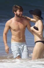 MILEY CYRUS in Bikini and Patrick Schwarzenegger on the Beach in Hawaii 2101