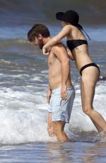 MILEY CYRUS in Bikini and Patrick Schwarzenegger on the Beach in Hawaii 2101