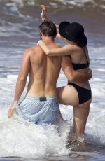 MILEY CYRUS in Bikini and Patrick Schwarzenegger on the Beach in Hawaii 2101