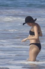 MILEY CYRUS in Bikini and Patrick Schwarzenegger on the Beach in Hawaii 2101